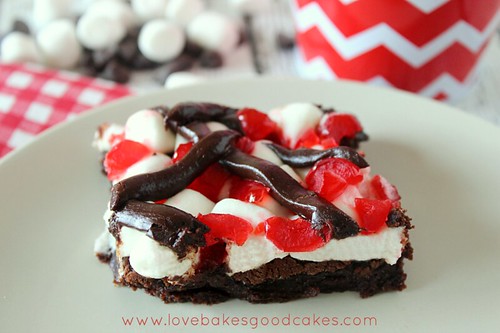 Chocolate Cherry Marshmallow Brownies up close on a white plate.