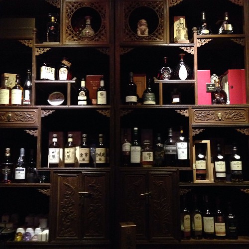 Rosewood cabinet used to display Whisky, Cognac and Bourbon.
