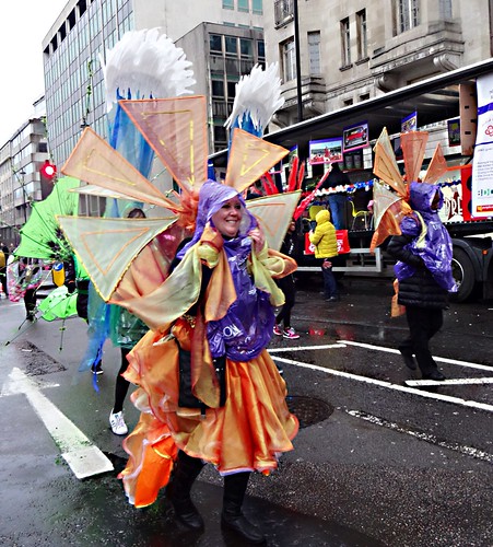 Many happy faces in the parade. Raining? So what! width=