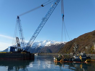 After almost three months underwater, the fishing vessel Fate Hunter was successfully lifted, refloated and towed to Cordova, Alaska, on Oct. 29, 2013. Following the grounding of the fishing vessel near Shoup Bay on Aug. 11, 2013, Alaska Marine Response and Alaska Chaudux deployed boom, removed all recoverable fuel, hydraulic and lube oils and stabilized the Fate Hunter in preparation for salvage operations to remove the vessel from the rock ledge on which it rested. (Photo courtesy of Global Diving & Salvage Inc.)