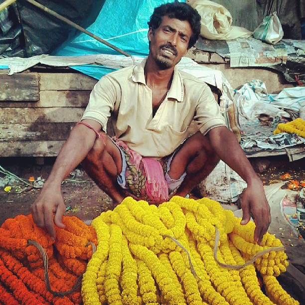Selling flowers in Calcutta.