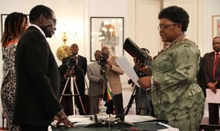 Republic of Zimbabwe President Robert Mugabe and Vice President Joice Mujuru at the swearing in ceremony for the new cabinet. by Pan-African News Wire File Photos