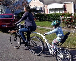 Maybelle on her new bike, not screaming
