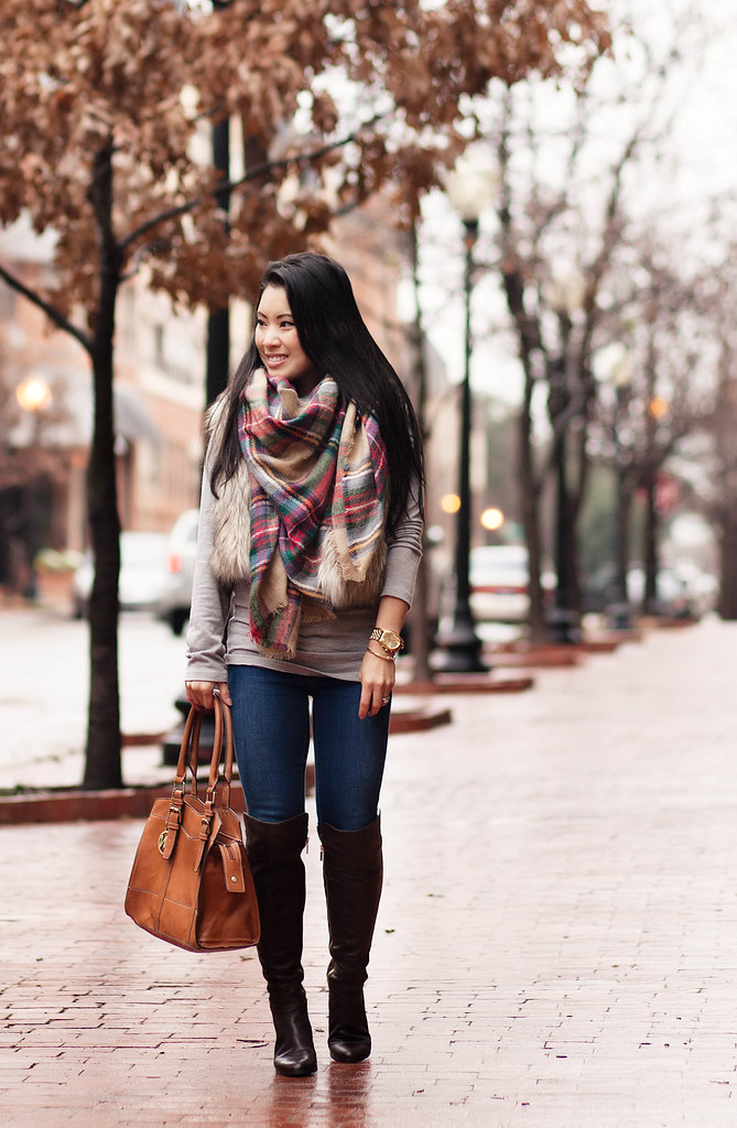 cute & little blog | plaid scarf, fur vest, skinny jeans, michael kors bromley over the knee otk boots | winter outfit layering