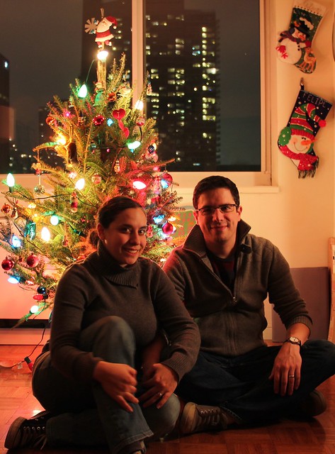 Felipe and Silva in front of the tree