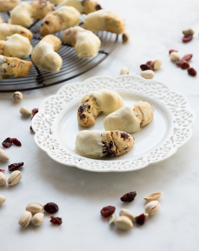 White Chocolate Dipped Pistachio Cranberry Crescent Cookies www.pineappleandcoconut.com