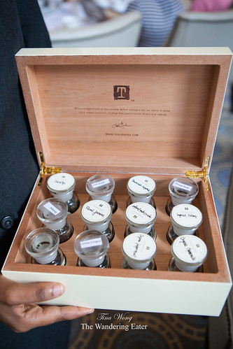 Tea chest to smell the scents of various teas offered