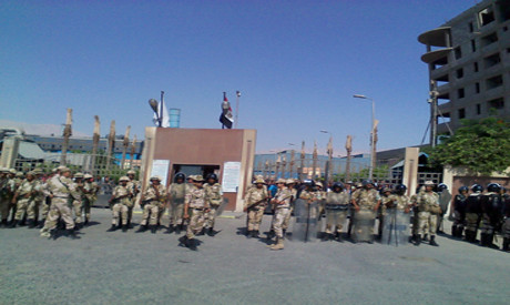 Egyptian military outside Suez Steel Company August 12, 2013. The workers have been on strike since July 23. by Pan-African News Wire File Photos