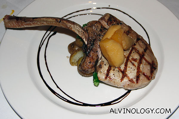 Grilled Royal Pork Chop (S$48) - served with baby potatoes and broccollini atop caramelized apple in garlic jus
