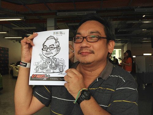 caricature live sketching for NTUC U Grand Prix Experience 2013 - 1