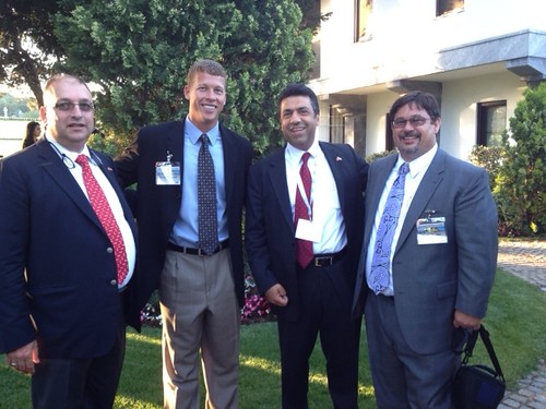 Scott Hudson (second from left) stands in front of the U.S. Embassy in Turkey with two Turkish businessmen, a nut buyer (left) and marketing group CEO.  The fourth man is a soybean farmer from the Midwest (far right).