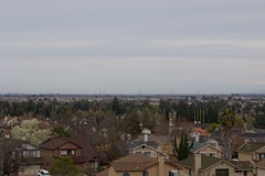 			Klaus Naujok posted a photo:	View of my neighborhood from the water tower hill. Photo taken with the Konica Minolta AF DT 18–70mm @ 70mm (105mm FF).