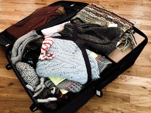 giant suitcase full of handknits