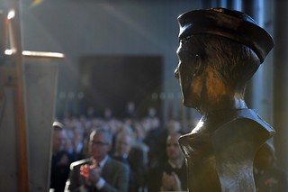 A bust of Douglas A. Munro – created by John Tuomisto-Bell and sculpted and molded by Tyson Snow – was unveiled at the dedication ceremony of the Douglas A. Munro Coast Guard Headquarters Building in a ceremony held  November 113, 2013 U.S. Coast Guard photo by Petty Officer 2nd Class Patrick Kelley