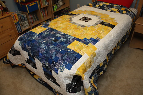 Pixelated minion quilt all ready for being loved
