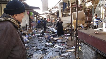 Iraqis look at damage done on Christmas Day bombings of 2013. The United States says it is sending hellfire missiles to the formerly-occupied Middle Eastern state. by Pan-African News Wire File Photos