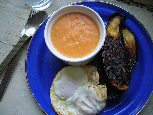 fried eggs, roasted eggplant, and creamed carrot soup