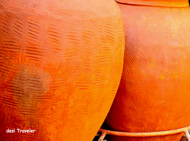 orange earthen pots for water