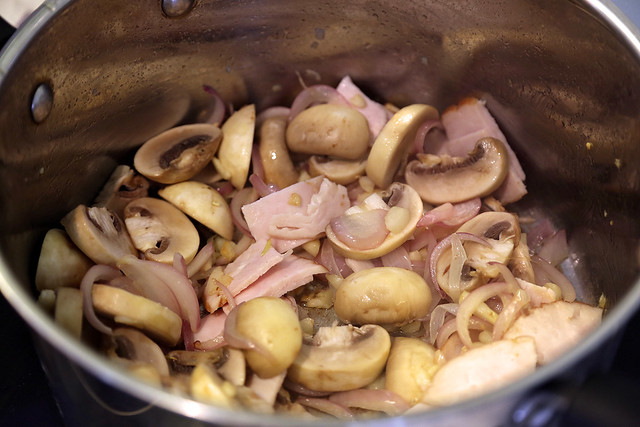 Saute onion and garlic, and toss in turkey and mushroom slices