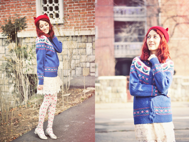 Red hat and printed cardigan