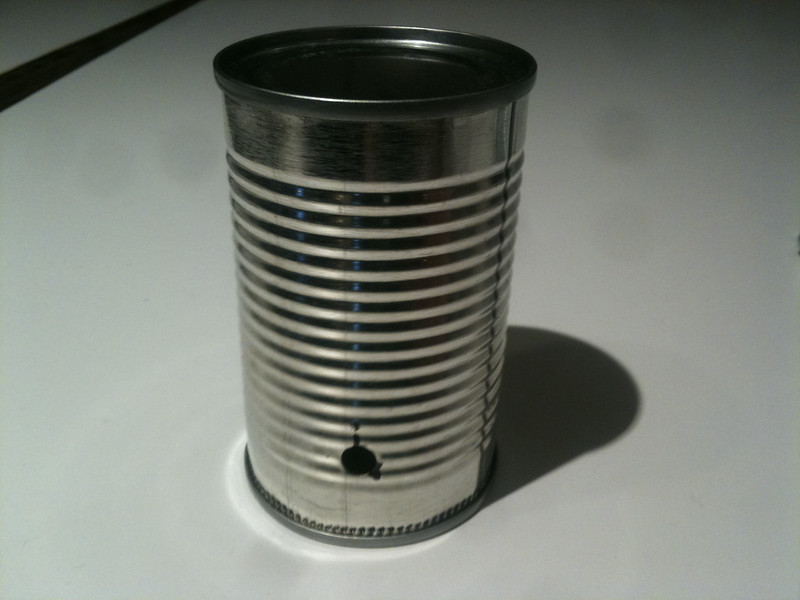 Make holes in can