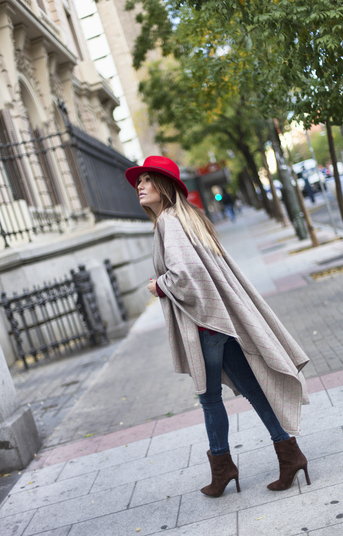 street style barbara crespo merino royale poncho red hat winter is coming outfit