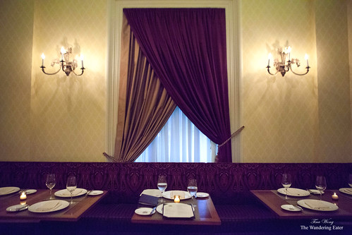 Beautiful drapes by the banquette
