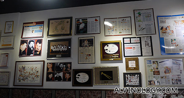 Media coverages on Chef Teo adorned the wall of his studio 