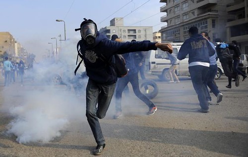 Egyptian clashes with police on December 20, 2013. The protesters were opposing the military-backed regime in Cairo. by Pan-African News Wire File Photos