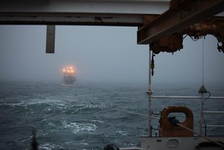 The Coast Guard Cutter Waesche tows the fishing vessel Alaska Mist through the Bering Sea near Amak Island, Alaska, Nov. 13, 2013. Joint effort between the crew of the Coast Guard Cutter Waesche, and a Coast Guard Air Station Kodiak MH-60 Jayhawk helicopter crew, the 207-foot tug Resolve Pioneer and the fishing vessel Pavlof resulted in the successful tow of the Alaska Mist and safe disembarkation of the crew to Dutch Harbor. U.S. Coast Guard photo by Coast Guard Cutter Waesche.