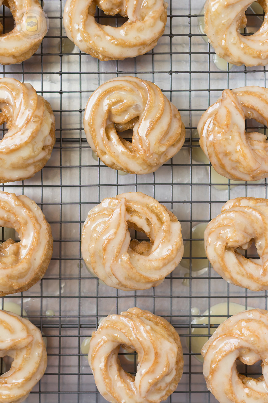 French Honey Crullers glaze on wire rack