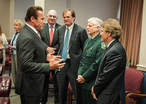 Former California Governor Arnold Schwarzenegger was named an Honorary Forest Ranger today during a ceremony at the USDA Whitten Building. Pictured are (right to left) Leo Kay, Director, Forest Service Office of Communication; Thomas Tidwell, Chief, U.S. Forest Service; Undersecretary Robert Bonnie; Deputy Undersecretary Arthur (Butch) Blazer, and former Governor Schwarzenegger (Photo by Bob Nichols, USDA)