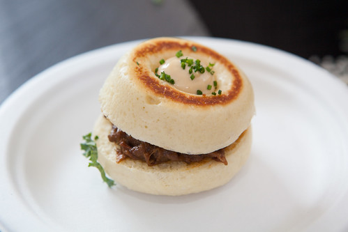 Steamed brioche bun, pulled oxtail, mushroom and kale sandwich by Manzanilla