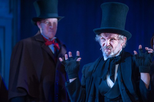 Anthony Bowers as Fred and Christopher Fairbank as Scrooge. Photo © Tommy ga Ken Wan  