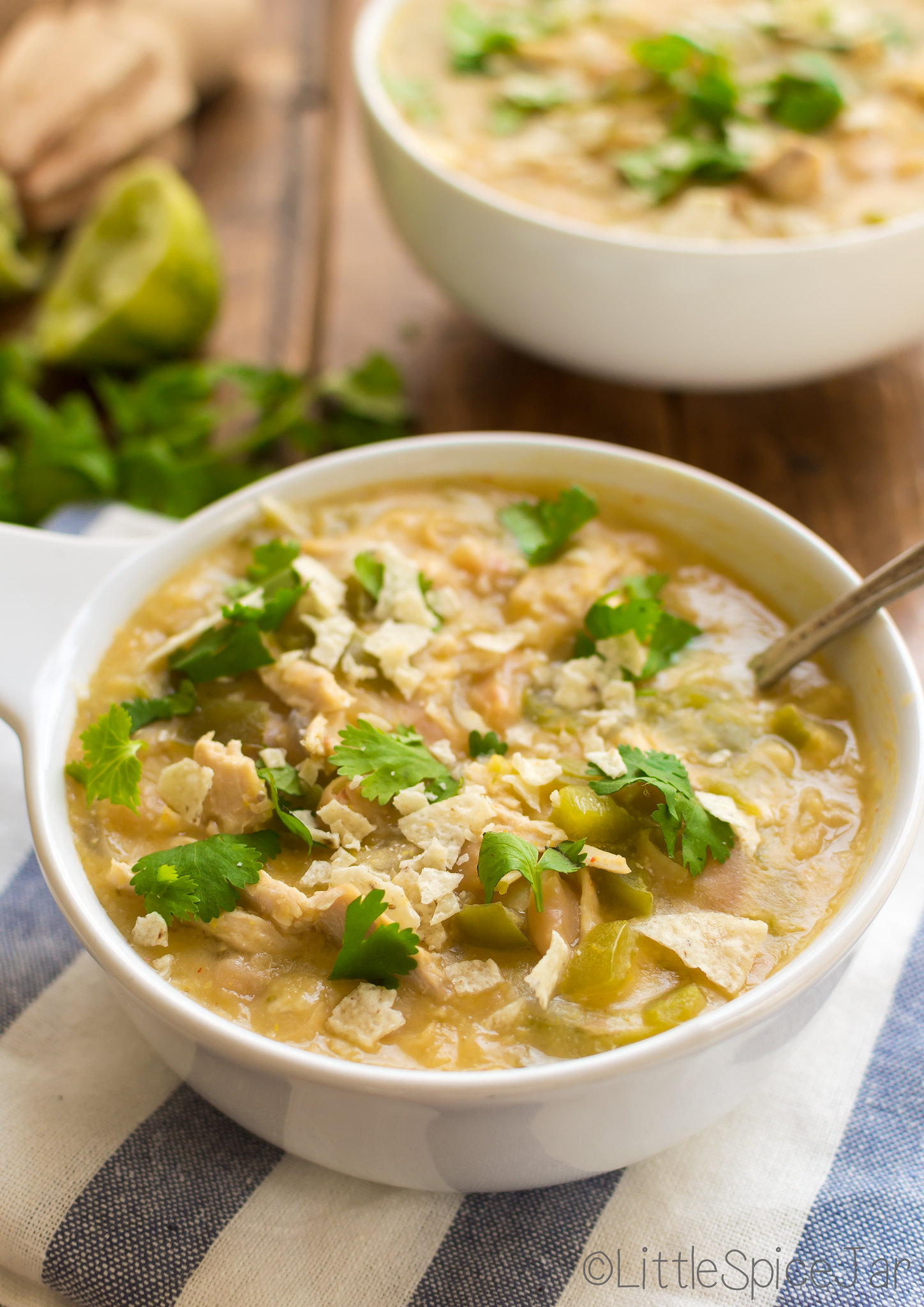 bowls of white chicken chili with spoon 