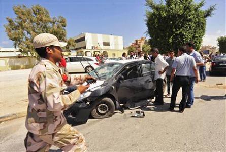 Libyan rebel intelligence personnel attacked in Benghazi. The country has been experiencing a spat of attacks against the U.S.-backed GNC regime. by Pan-African News Wire File Photos