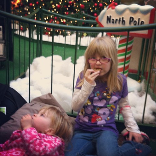 Camped out in line eating cookies while we wait for this mall Santa to get back from his break.