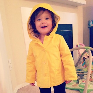 Someone's excited about her new rain coat - a clearance find from @babygap!