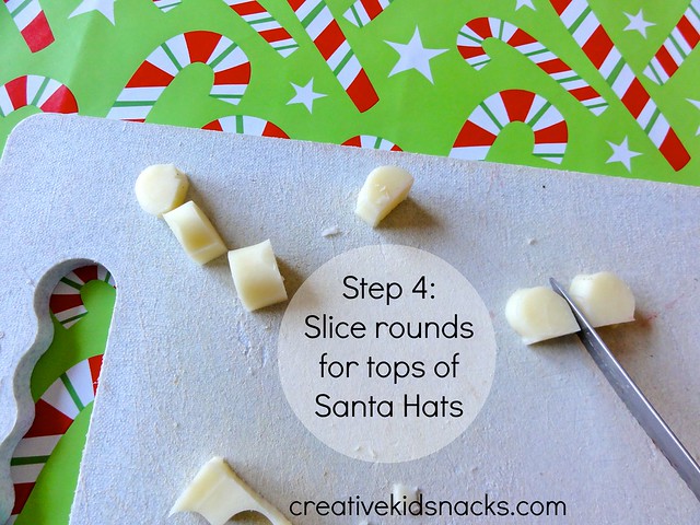 Creative Kid Snacks: Santa Hat Poppers - perfect kids finger food for a Christmas party!