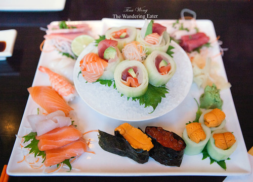 Customized sushi and sashini platter of four different orders
