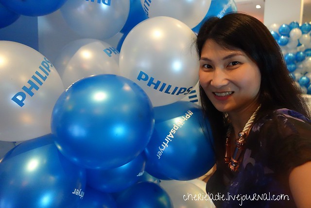 cherie posing with balloons