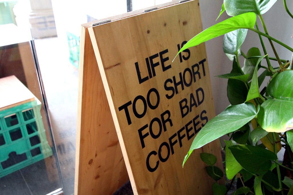 The Plain Cafe: Life is too short for bad coffee signboard.