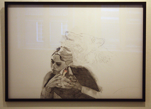 Kvinnan på teckningen lyssnar i en snäcka, med en varg bakom ryggen. Teckning av Annika Bergqvist Kupiainen.