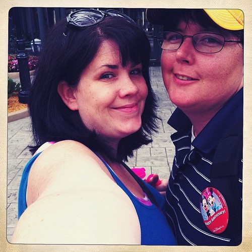 My love and I in disney two years ago.  We'll be back soon.  Also, this pic *almost* makes me want to cut my hair.  #tbt
