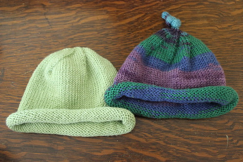 two baby hats