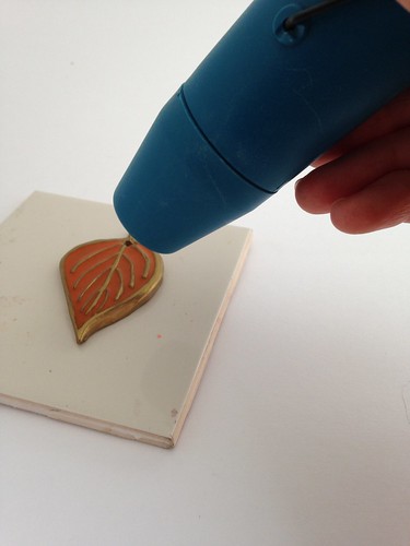 CraftyGoat's Notes: Make liquid clay clear as glass by setting with heat embossing gun
