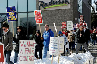 Picketers protest outside the newspaper's annual sport banquet at the Radisson Center.