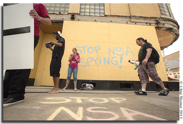 Chalk on wall and sidewalk during ralley against the NSA