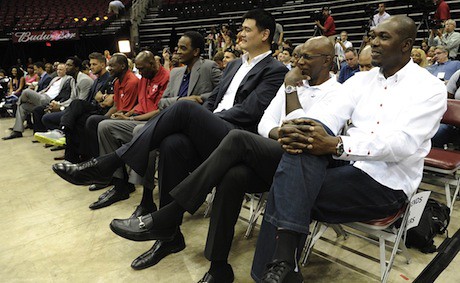 July 13, 2013 - Yao Ming sits among former Rocket greats and current Rocket Chandler Parsons (at end)