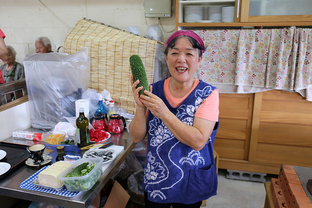 Ms Emiko Kinjo showing us "goya" or bittergourd, which is very predominant in their diet